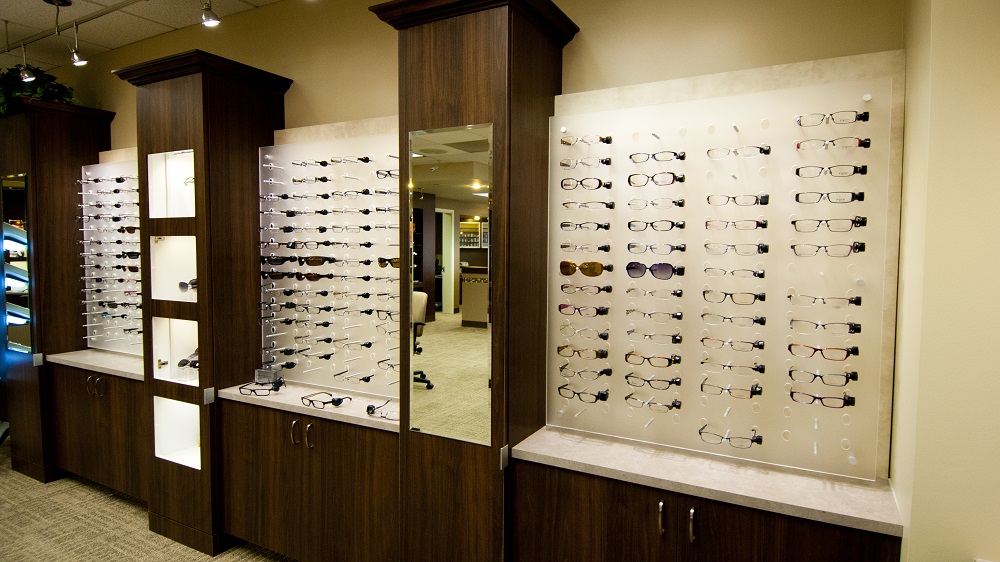 ennco display systems, frame displays, optical store displays, eyewear wall displays, eyewear wall displays, optial displays, sunglass wall display, optical office design