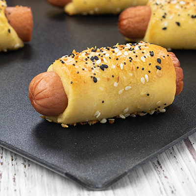 Pigs in a blanket with sprinkled seasoning