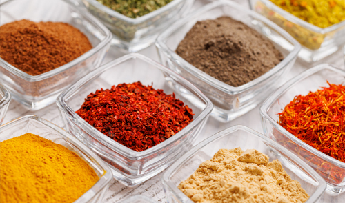 A close up picture of different seasoning blends