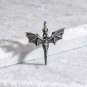 Sterling Silver Flying Dragon Charm on grey backround