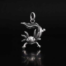 Sterling Silver Axolotl Charm on dark background