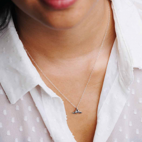 Sterling Silver Mini Heart with Wings Necklace on Neck