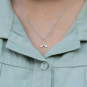 Silver Whale Tail Necklace on model