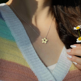 Bronze Flat Plate Daisy Necklace on Sterling Silver Chain on neck