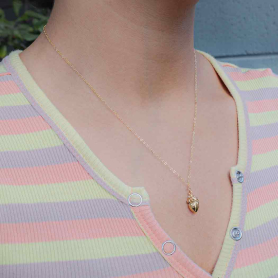 Bronze Anatomical Heart Necklace on Neck