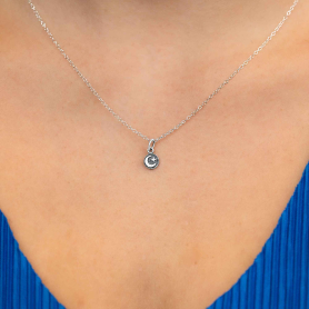 Sterling Silver Tiny Moon and Star Coin Necklace on neck