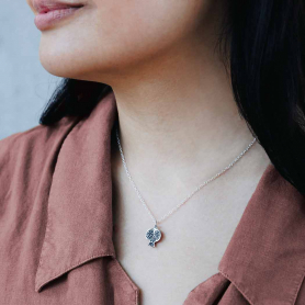 sterling silver pomegrante necklace on neck