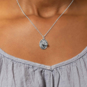 Sterling Silver Oval Dragon Head Necklace on model