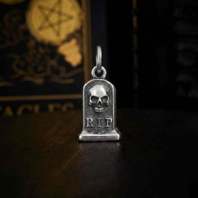 Sterling Silver Tombstone Charm on black background