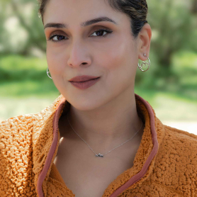 Woman wearing Sterling Silver Openwork Mountain Hoop Earrings 