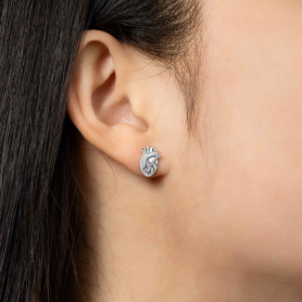 Sterling Silver Anatomical Heart Post Earrings on model