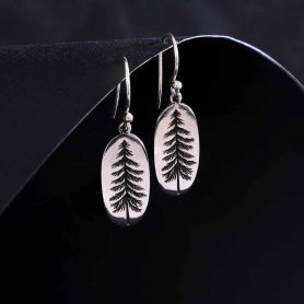 Sterling Silver Oval Pine Tree Dangle Earrings on dark background