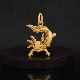 Bronze Axolotl Charm on dark background