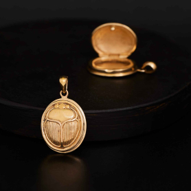 Bronze Scarab Locket on dark background