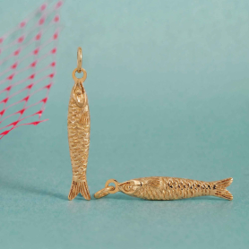 Bronze Sardine Charms on blue background