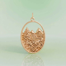 Bronze Mountain and River Pendant 30x19mm on green background