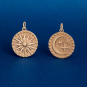 Bronze Reversible Sun and Moon Pendant on dark blue background
