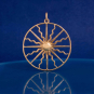Bronze Radiant Sun Pendant  on dark blue background