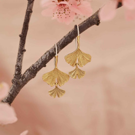 Bronze Ginkgo Hook Earrings on pink background