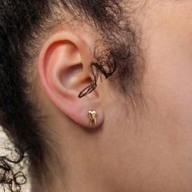 Bronze Dimensional Tooth Stud Earrings 10x5mm on ear