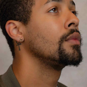 Bronze Skull Earrings on model