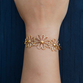Bronze Openwork Daisy Chain Bracelet on wrist