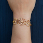 Bronze Openwork Daisy Chain Bracelet on wrist