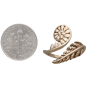 Bronze Adjustable Fern Ring next to dime
