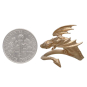 Bronze Adjustable Dragon Ring next to dime