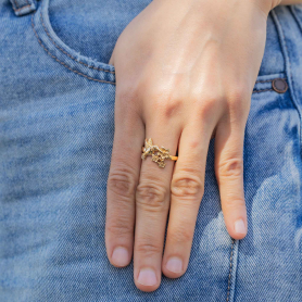 Bronze Hummingbird and Flower Ring on hand