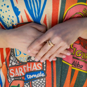 Bronze Adjustable Sardine Ring on hand