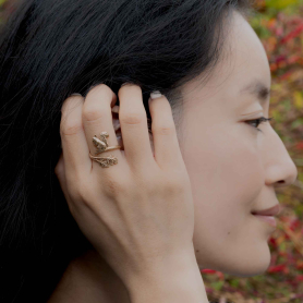 Bronze Adjustable Squirrel and Oak Leaf Ring on hand