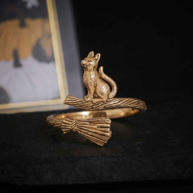 Bronze Adjustable Cat on Broomstick Ring on dark background
