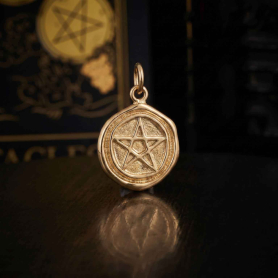 Bronze Pentagram Wax Seal Charm on dark background