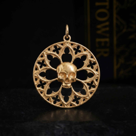 Bronze Gothic Window Charm with Skull on dark background 