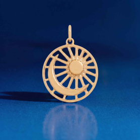 Bronze Moon and Sun Pendant on blue background