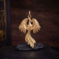 Bronze Phoenix Charm 32x19mm on dark background