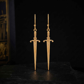 Sword Earrings on dark background