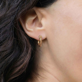 Bronze Ouroboros Huggie Hoop Earrings on ear