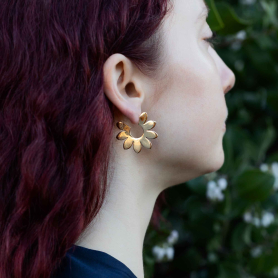 Bronze Flower Petal Hoop Post Earrings on ear