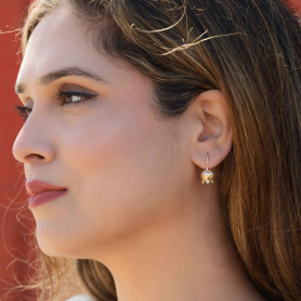 Bronze Single Lily of the Valley Hook Earrings on ear