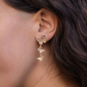 Bronze Three Butterfly Post Earring on ear