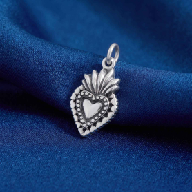 Luxe Silver Plate Sacred Heart Charm on blue