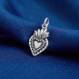 Luxe Silver Plate Sacred Heart Charm on blue