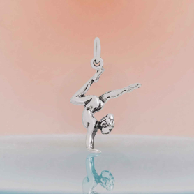 Luxe Silver Plate Gymnast Charm on orange background