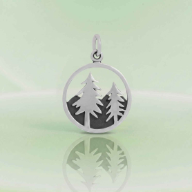 Luxe Silver Plate Tree Pendant  with Mountains on green background