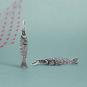 Luxe Silver Plate Small Sardine Charms on blue background