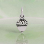 Luxe Silver Plate Acorn Charm on green background