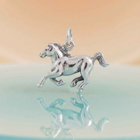 Luxe Silver Plate Horse Charm on orange and blue background