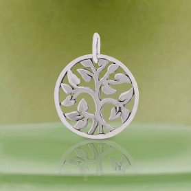Luxe Silver Plate Small Tree of Life Charm on green background